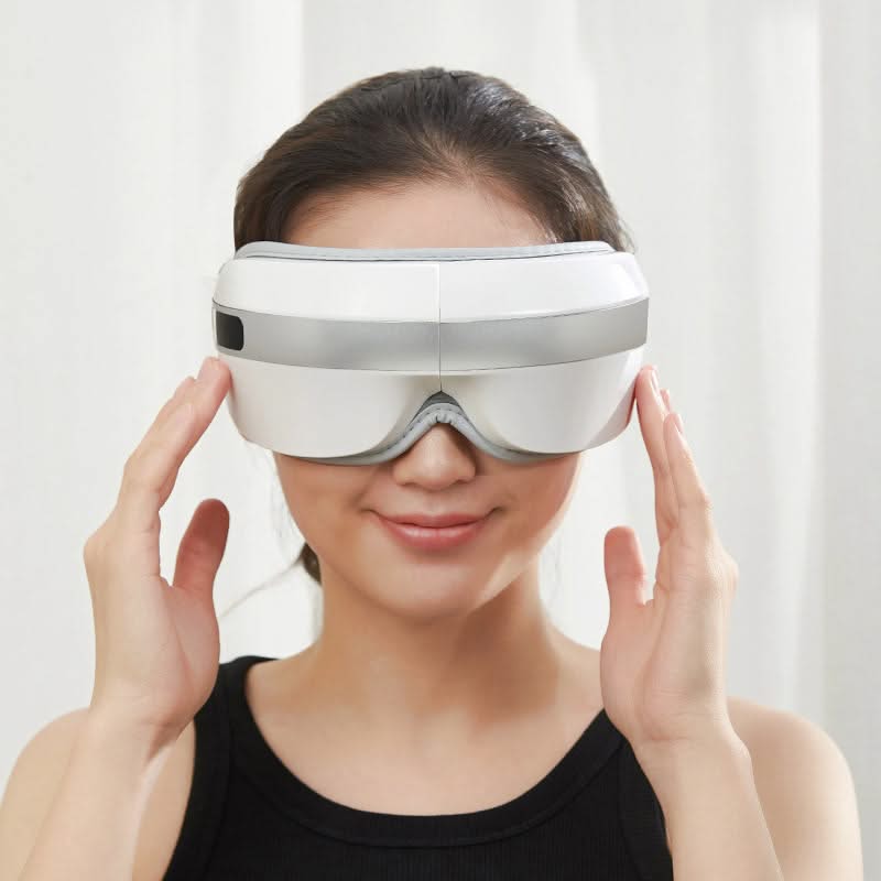 Bienelia™ Masajeador ocular con calor y música